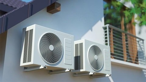 Pompe à chaleur à l'extérieur d'une maison
